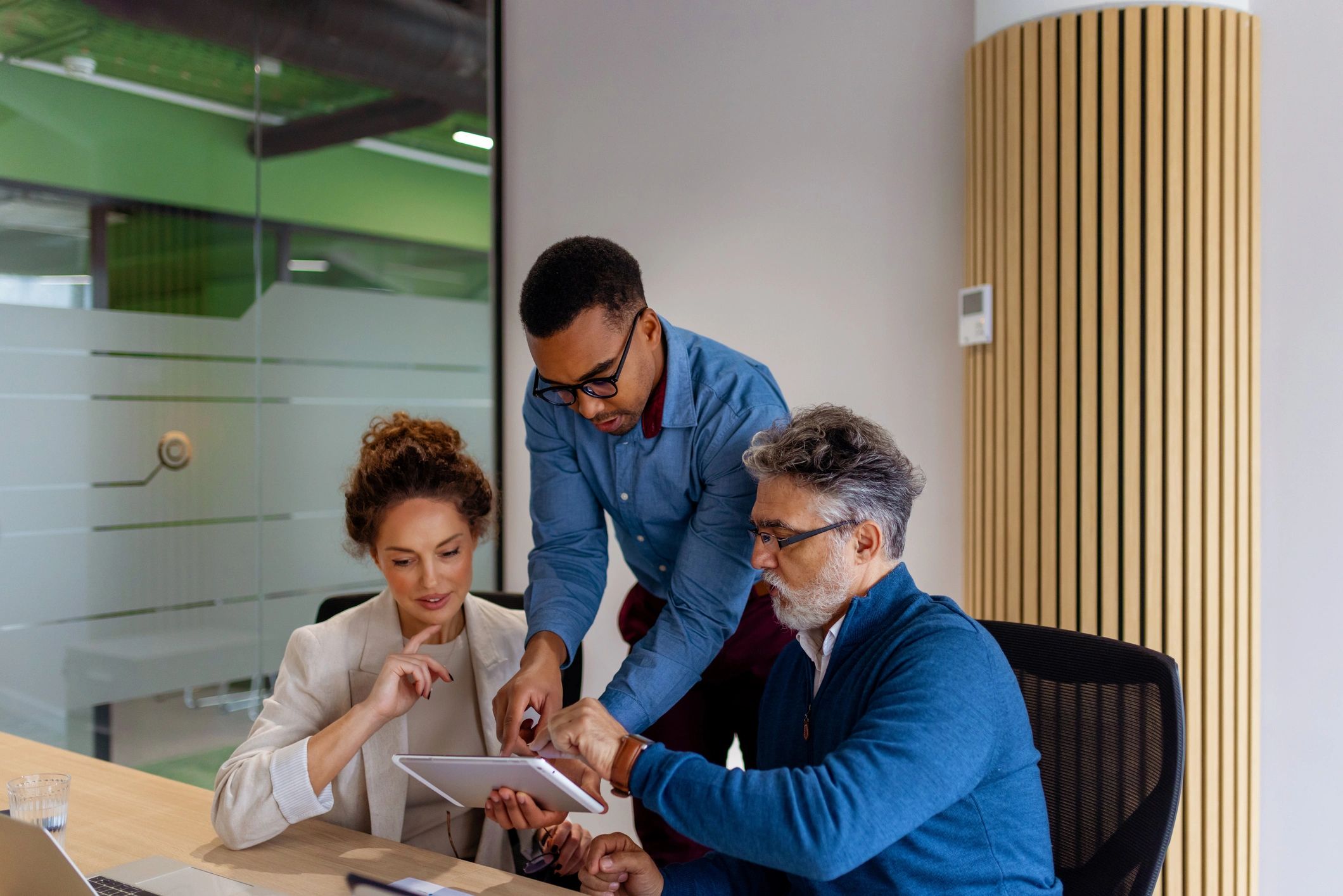 Business professionals reviewing strategy together